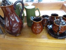 Two 1969 tea pots and a brown glazed part tea set