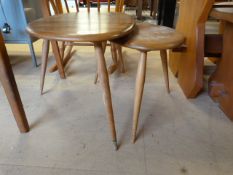 A pair of mid century nest of tables