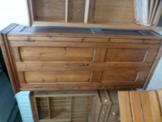 A Tall pitch pine Cupboard with two doors