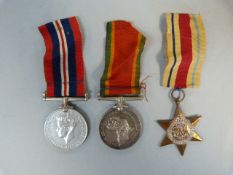 Three medals to D.W Reynolds 115567- The Africa Star, the General Service medal and the Africa