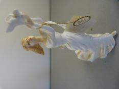 A Royal Doulton figure of a girl 'Thinking of You'
