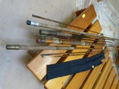 A quantity of various vintage fishing rods