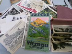 A quantity of vintage postcards etc