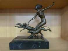 After Lorenzl, an Art Deco style bronze of a naked young lady with greyhounds on marble plinth