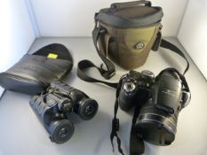 A Fuji Finepix digital camera and a pair of binoculars