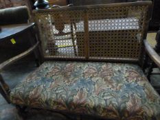 An oak frames Bergere style sofa