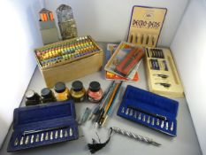 A Box containing vintage pens and inks