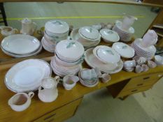 A quantity of part Peach Petal Dinner service