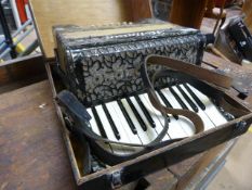 A vintage Hoffman (Saxony) piano accordian in case