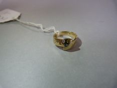 14 carat gold ring with six coloured inset stones