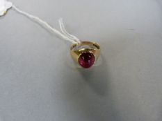 A 9ct Gold Cabachon Garnet Ring