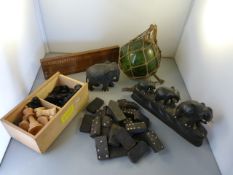 A quantity of vintage games, glass ball and elephant figures