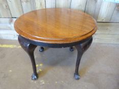 An oak table on cabriole legs