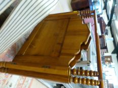 A Satinwood single bed