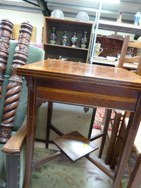 An Edwardian inlaid centre table