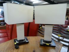 A pair of modern lamps