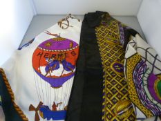 Two Hermes Paris silk scarfs. One depicting hot air balloons (good condition) and the other "Natural