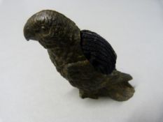 A Spelter pin cushion in the form of a parrot - cushion intact