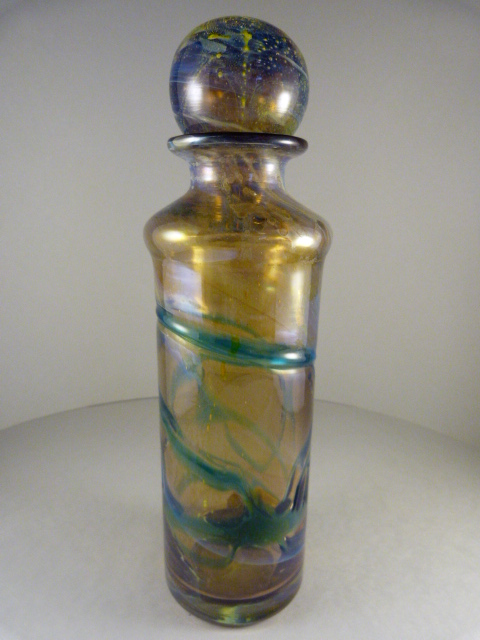 A studio glass decanter with stopper