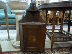 An inlaid corner cabinet