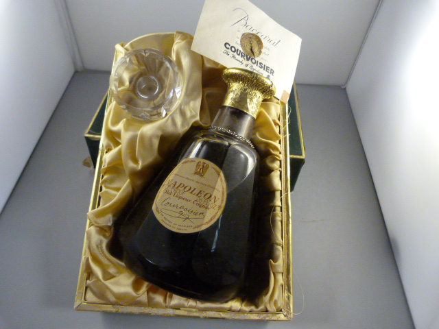 A bottle of Courvoisier Old Liqueur Cognac in a Baccarat crystal decanter in original presentation