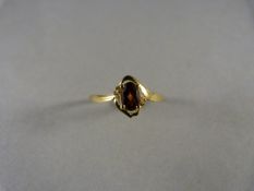 A 9ct Gold Garnet and diamond ring