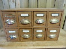 A Chest of eight drawers