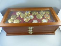 A quantity of various pocket watches in Display case to include one silver one