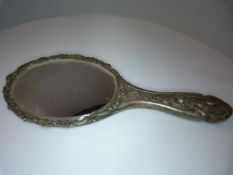 A Hallmarked Silver London 1902 dressing table mirror, with cherubs and foliate decoration