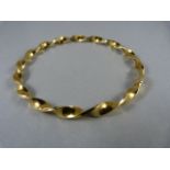 A 9ct Gold bangle - total weight 6.1g