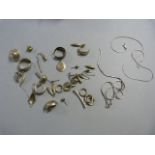 A Small quantity of scrap silver to include earrings and chains etc 63.1g