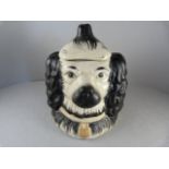 A Staffordshire double sided dogs head biscuit barrell c1800's