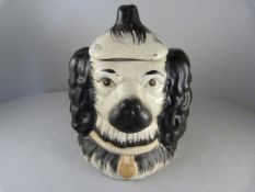 A Staffordshire double sided dogs head biscuit barrell c1800's