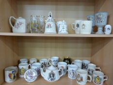 A small quantity of commemorative ware to include mugs and teapots etc