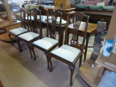 A set of four mahogany dining room chairs