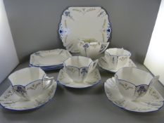 A part Shelley Tea set, Iris Pattern - compromising of 4 teacups, 4 saucers, 4 side plates, milk jug