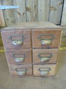 A Set of six filing drawers