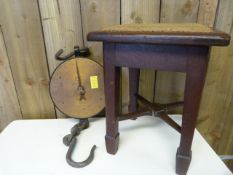 A Salter weighing scale and a small stool