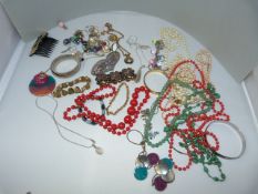 A small quantity of various costume jewellery to include some hallmarked pendants and earrings