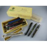 A collection of vintage pens to include Parker Pens etc