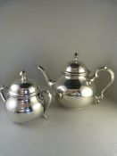 Teapot and sugar bowl marked to base "Hand crafted Pewter, Made in Sheffield England, ETAINS"