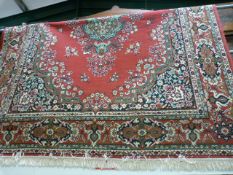 A Red ground rug 132inch x 95 inch