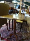 A Victorian mahogany rectangular tip up centre table