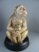 A Beswick Ware Monkey on a black pottery base - model number 397