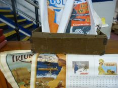 A case containing vintage posters including BSA cycles