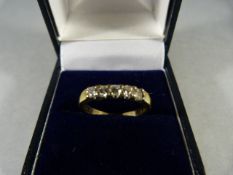 18ct Gold Ring with 5 diamonds