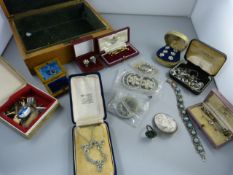 A box containing various costume jewellery, also to include a continental hallmarked brooch