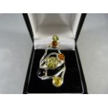 Silver Ring with 4 various amber stones