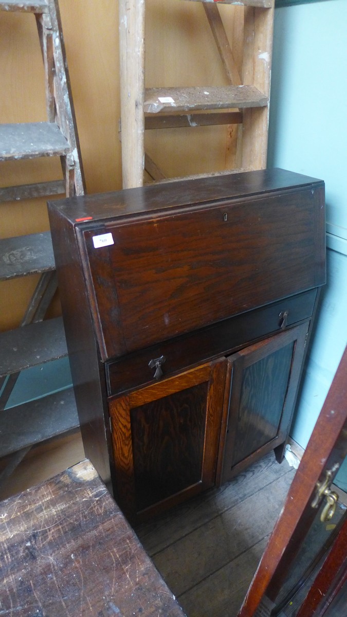 Small brown painted desk, the fall front inset pigeon holes,