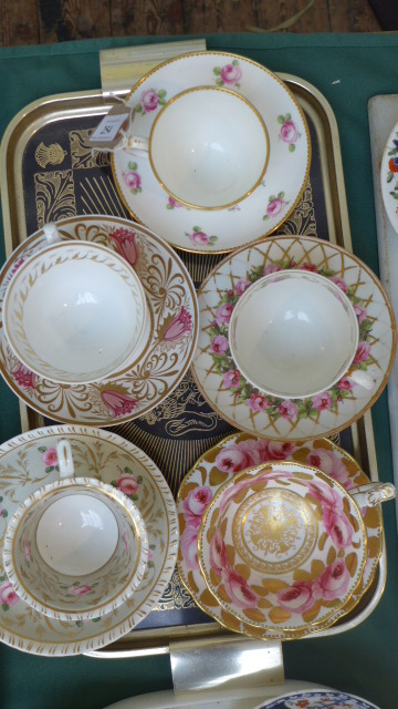 5 principally pink and cerise ground cups and saucers from various factories including early Derby,